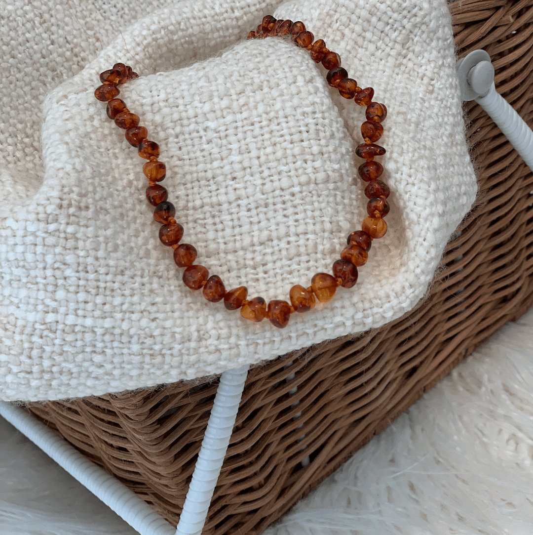 Baby Amber Teething Necklace colour COGNAC