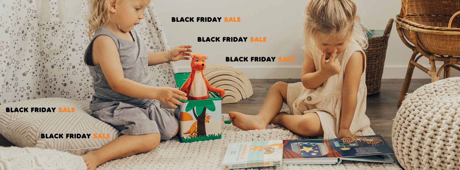 two toddlers playing puzzles books musical hop out mizzie