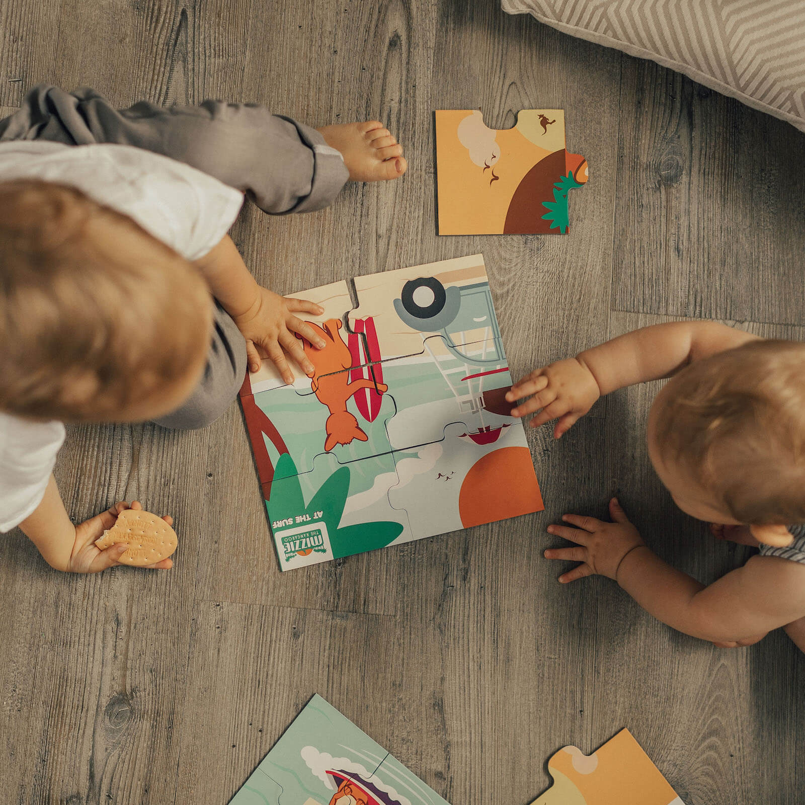 Boys playing with Mizzie The Kangaroo Puzzle