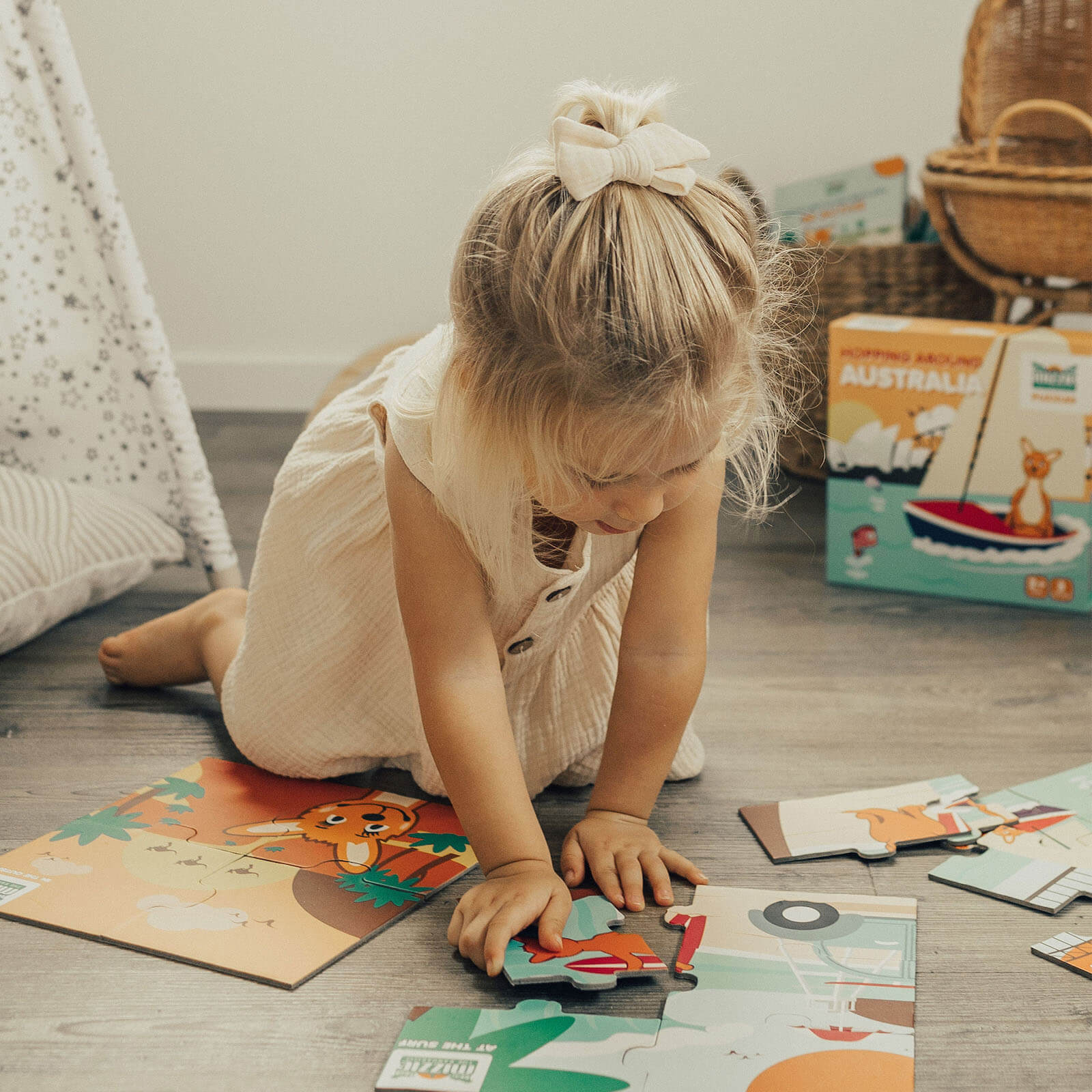 Girl playing with Mizzie The Kangaroo Puzzle